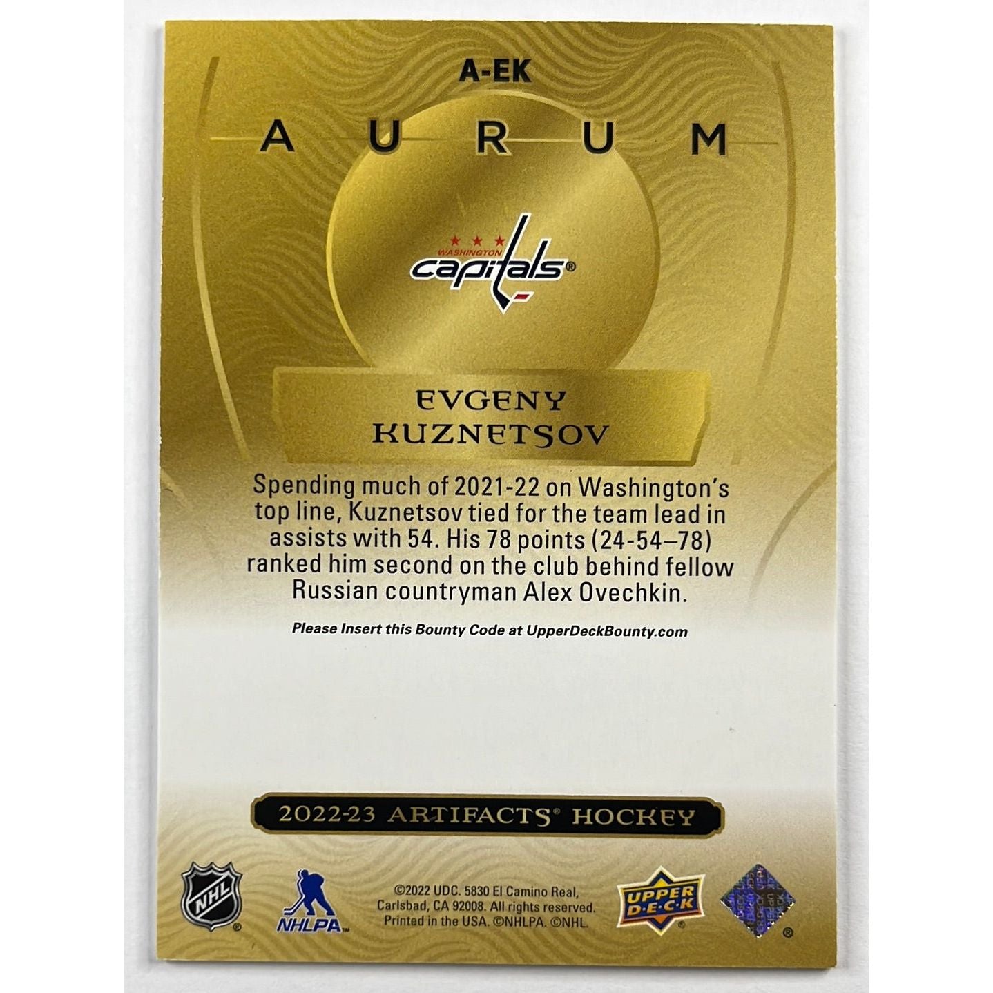 2022-23 Artifacts Evgeny Kuznetsov Green Aurum /25