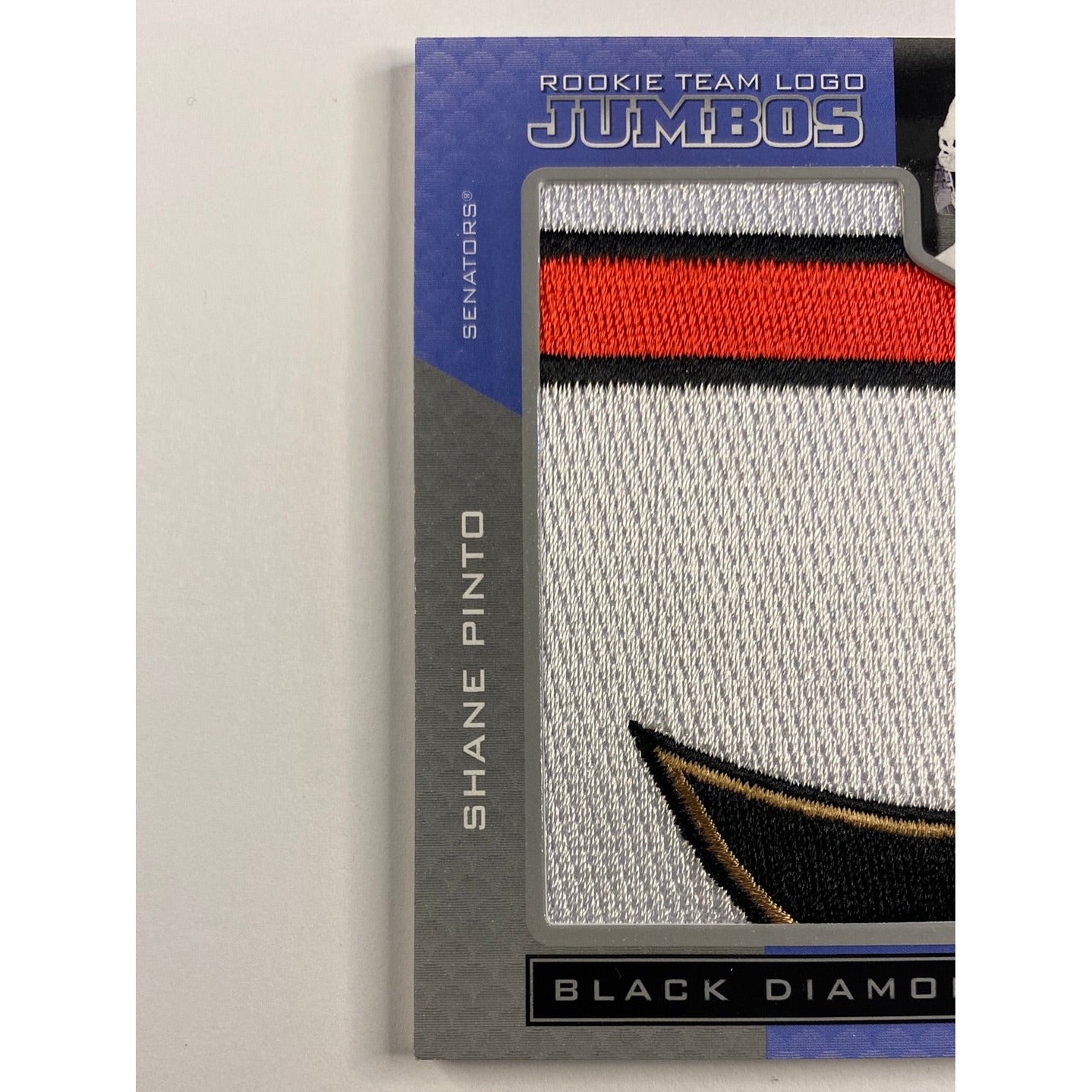 2021-22 Black Diamond Shane Pinto Rookie Team Logo Jumbos